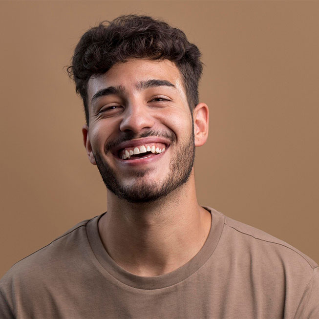 man feeling happy after dental implant